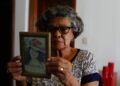 Dona Cida e o retrato da filha: orações diárias Foto: Leandro Ferreira/Hora Campinas