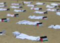 Protesto na Praia de Copacabana lembrou a morte de crianças palestinas durante as operações de guerra de Israel - Foto: Tânia Rêgo/Agência Brasil